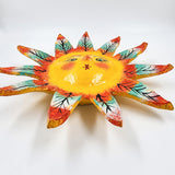 Máscara Sol hecha de coco