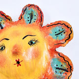 Máscara Sol hecha de coco