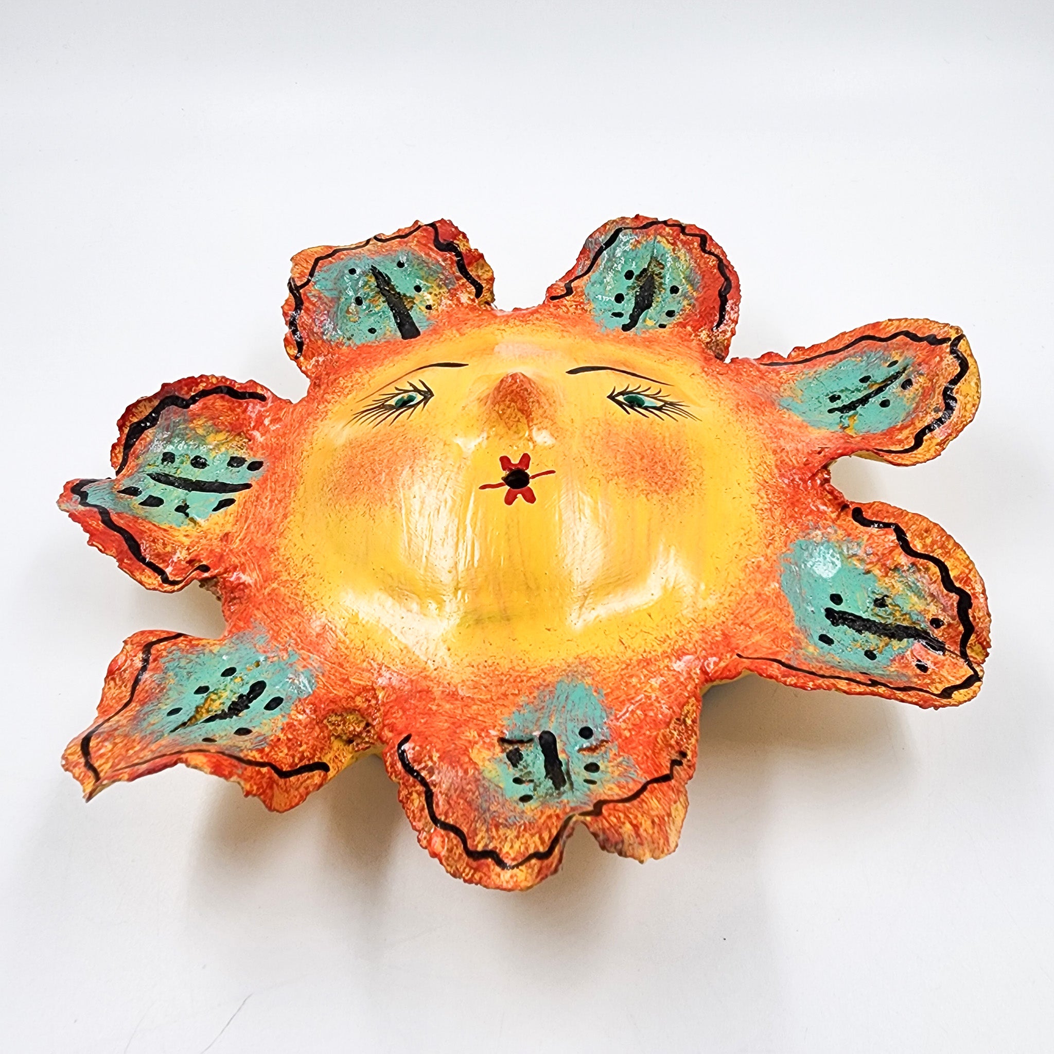 Máscara Sol hecha de coco