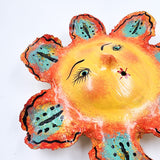 Máscara Sol hecha de coco