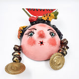 Máscara muñeca con sandía hecha de coco