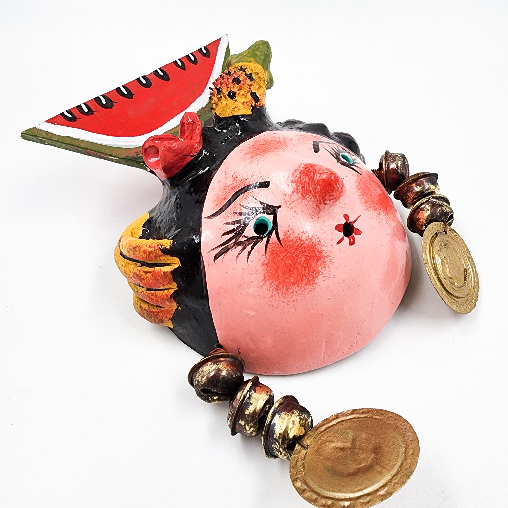 Máscara muñeca con sandía hecha de coco