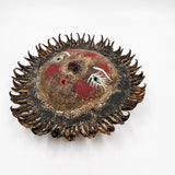 Sun mask made of coconut and seeds as rays