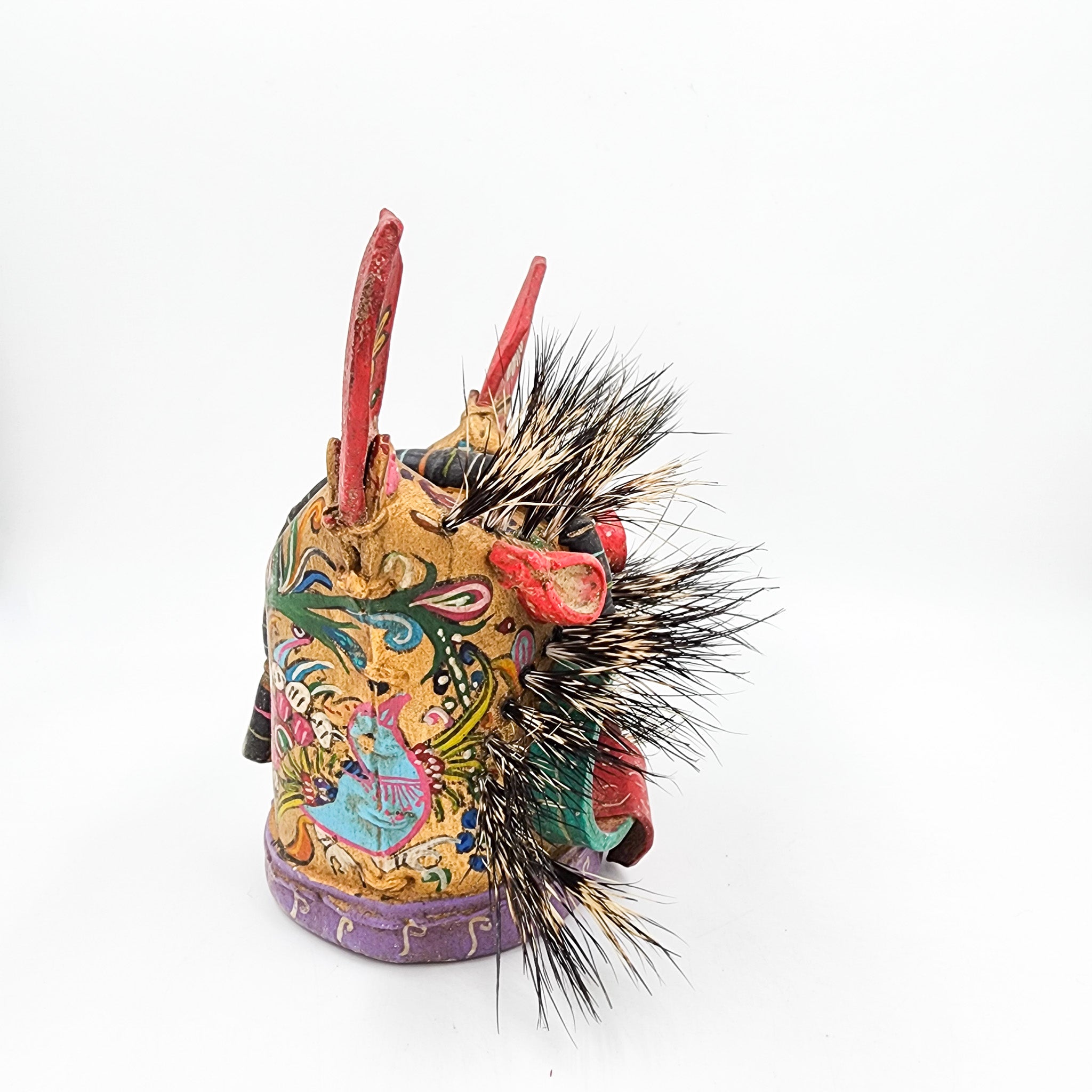 Máscara de Tecuán de cuero y pelo de jabalí