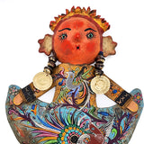 Muñeca artesanal con máscara de coco