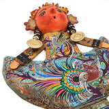 Muñeca artesanal con máscara de coco