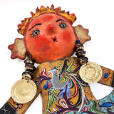 Muñeca artesanal con máscara de coco