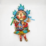 Muñeca de coco artesanal