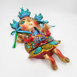 Muñeca de coco artesanal