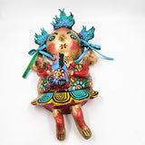 Muñeca de coco artesanal