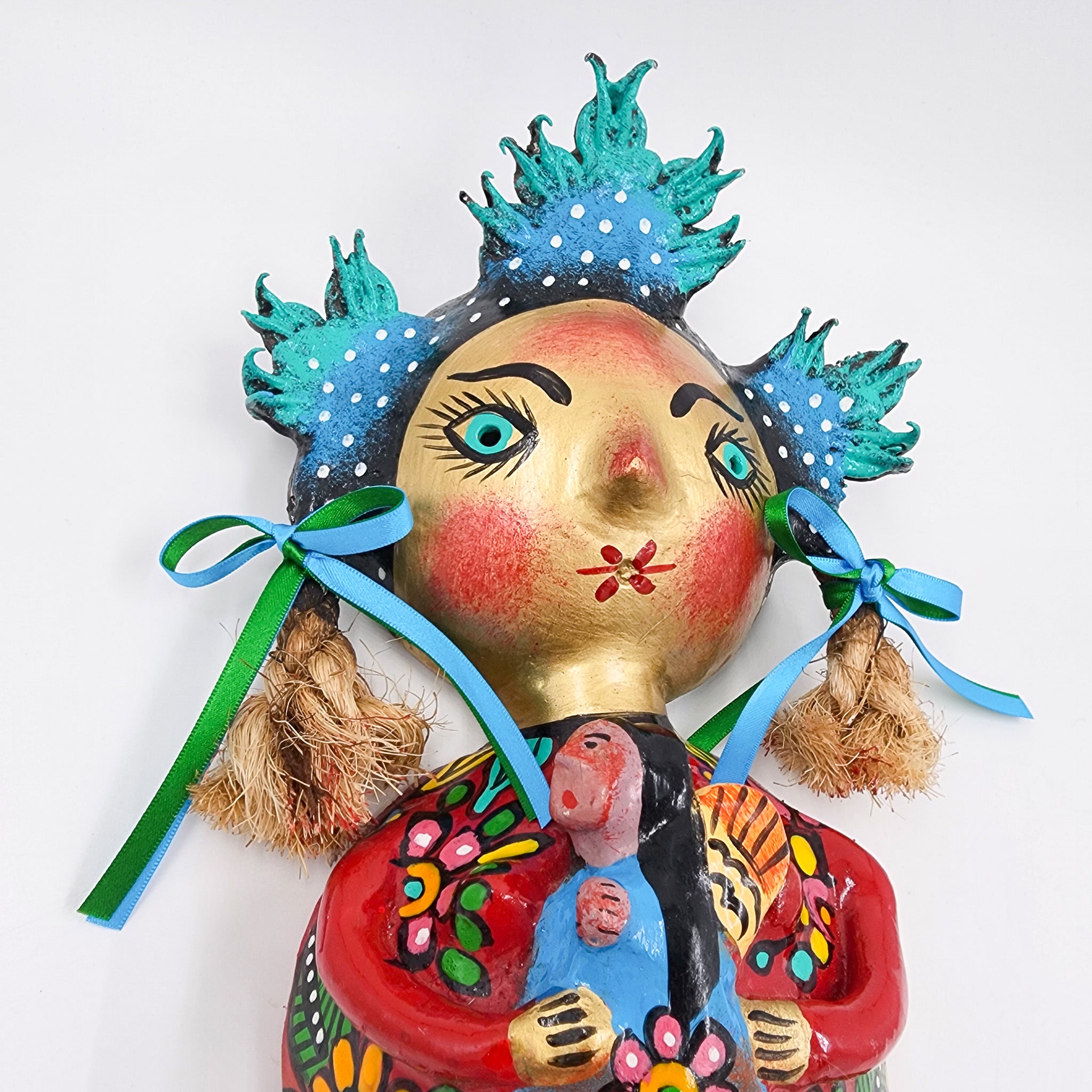 Muñeca de coco artesanal