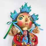 Muñeca de coco artesanal