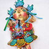 Muñeca de coco artesanal