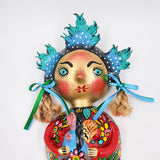 Muñeca de coco artesanal