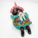 Muñeca de coco artesanal