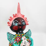 Muñeca de coco artesanal