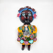 Muñeca de coco artesanal