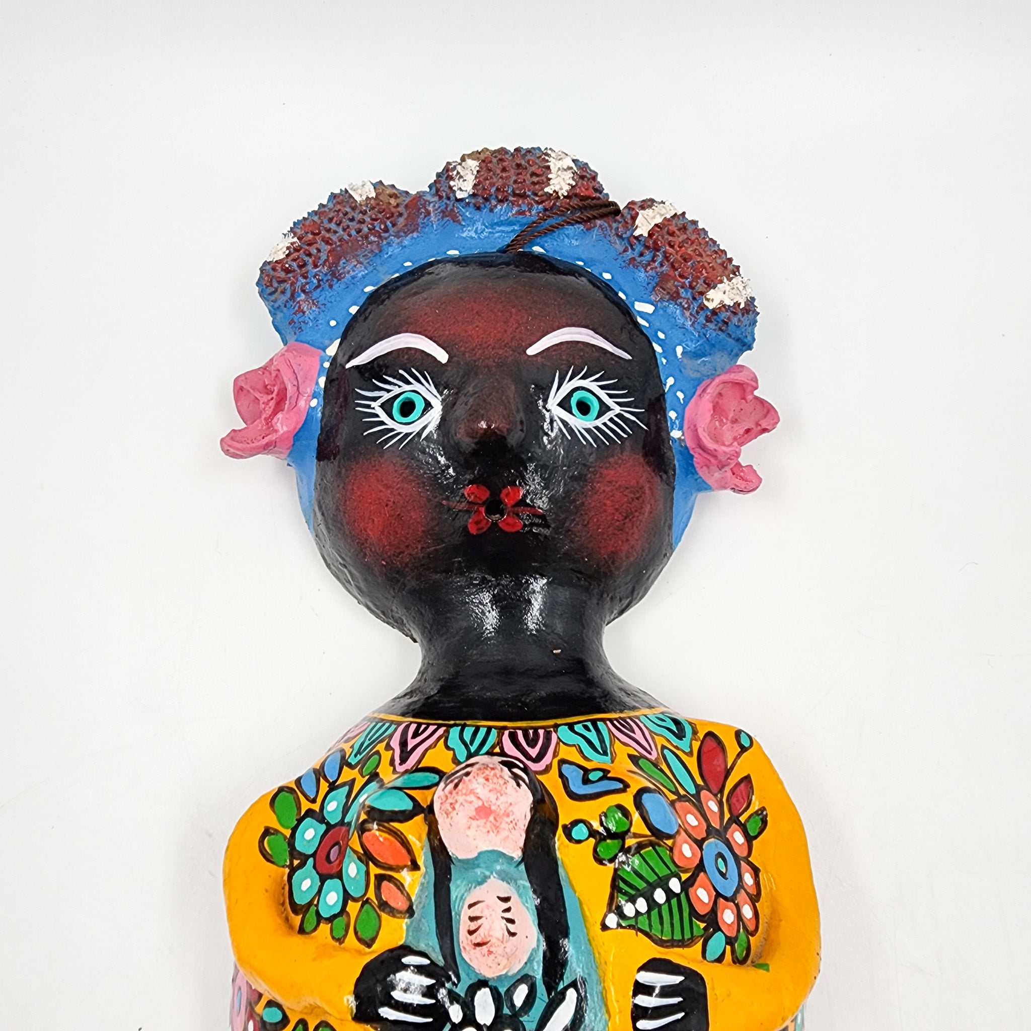 Muñeca de coco artesanal