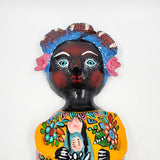 Muñeca de coco artesanal