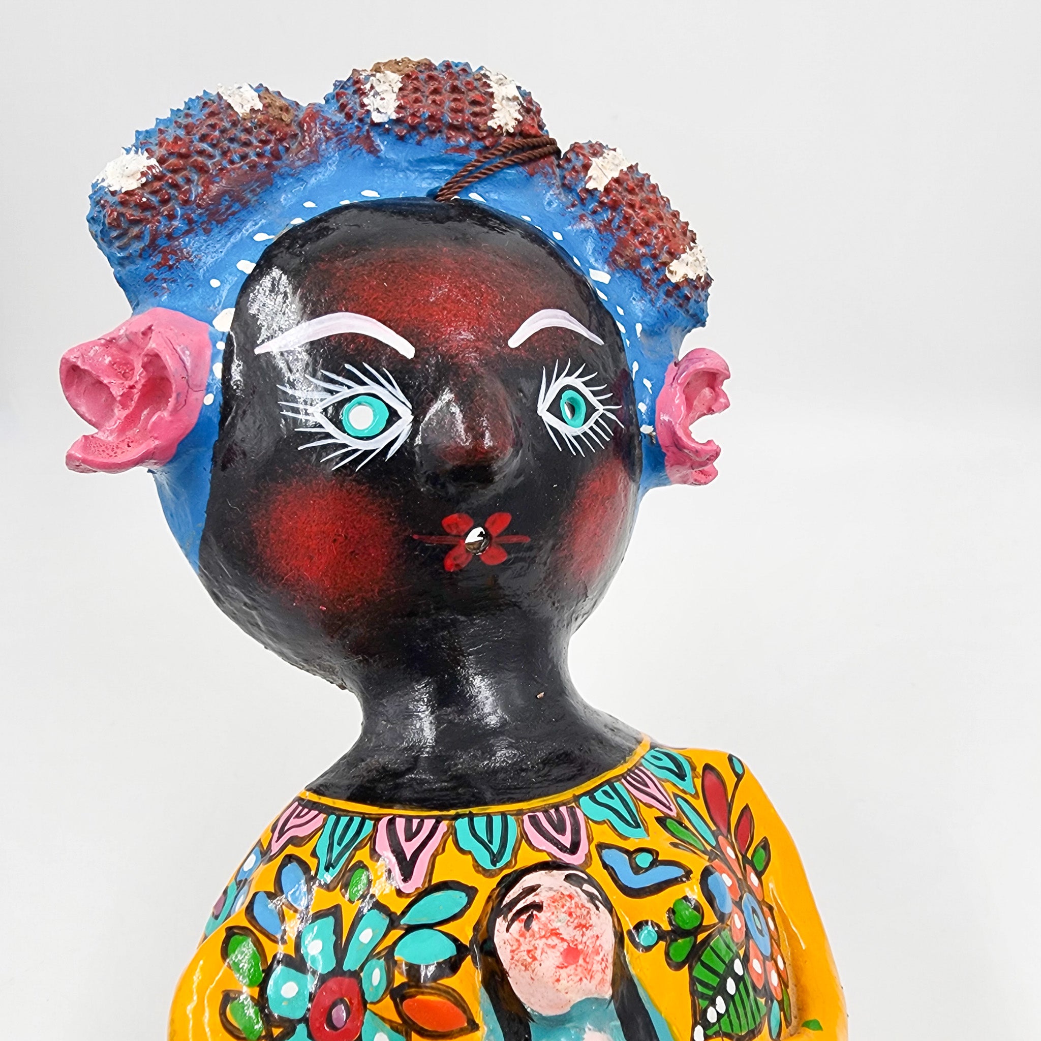 Muñeca de coco artesanal