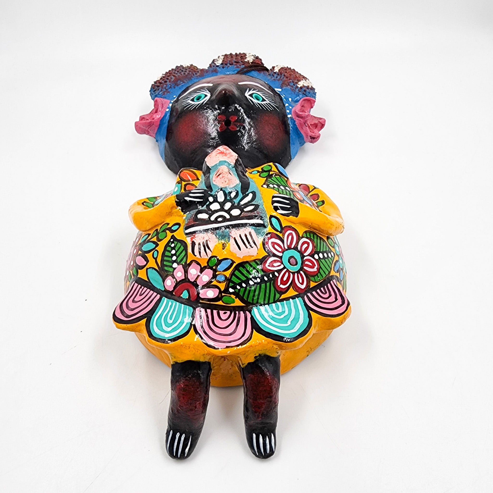 Muñeca de coco artesanal