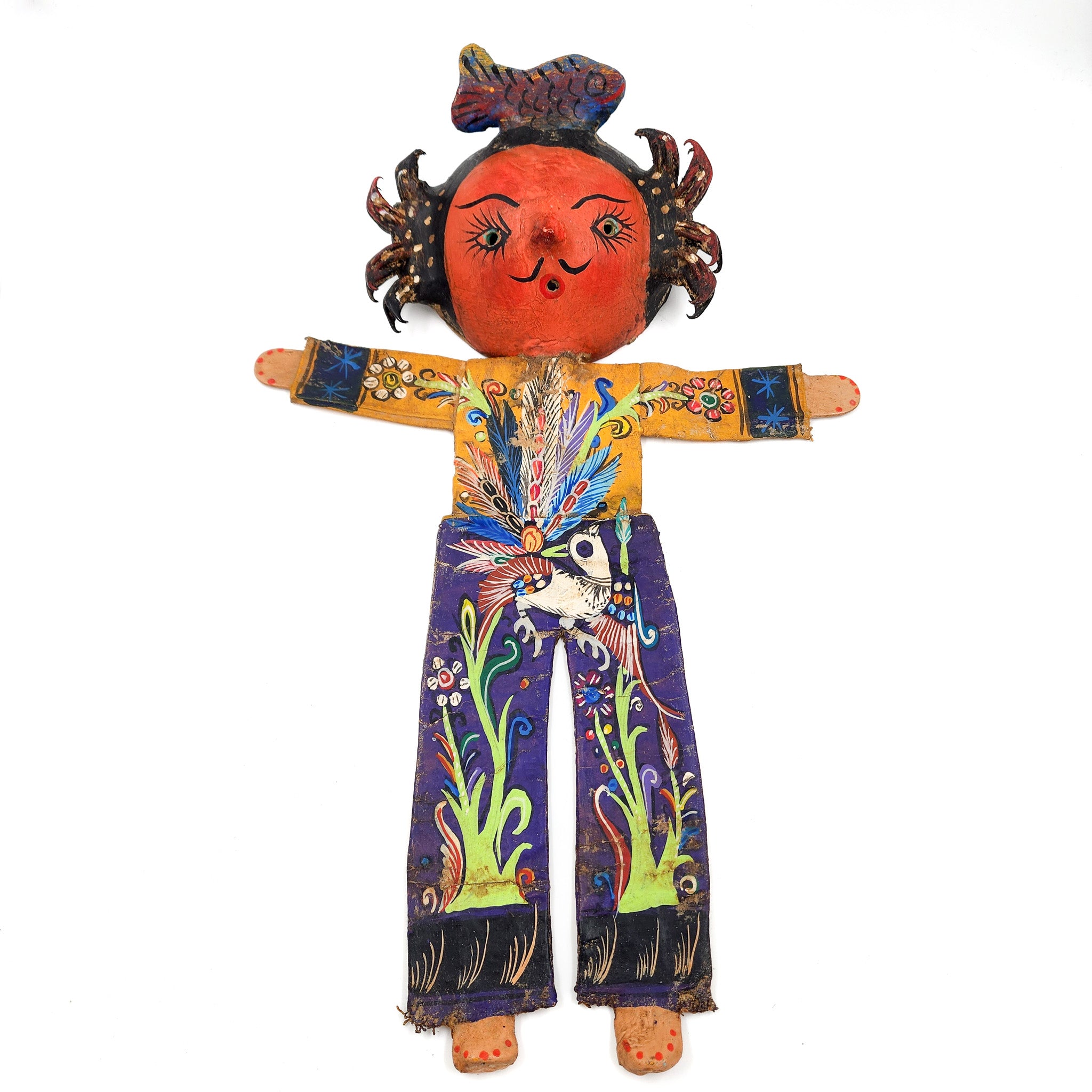 Muñeco artesanal con máscara de coco