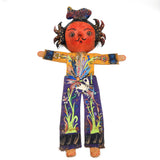 Muñeco artesanal con máscara de coco