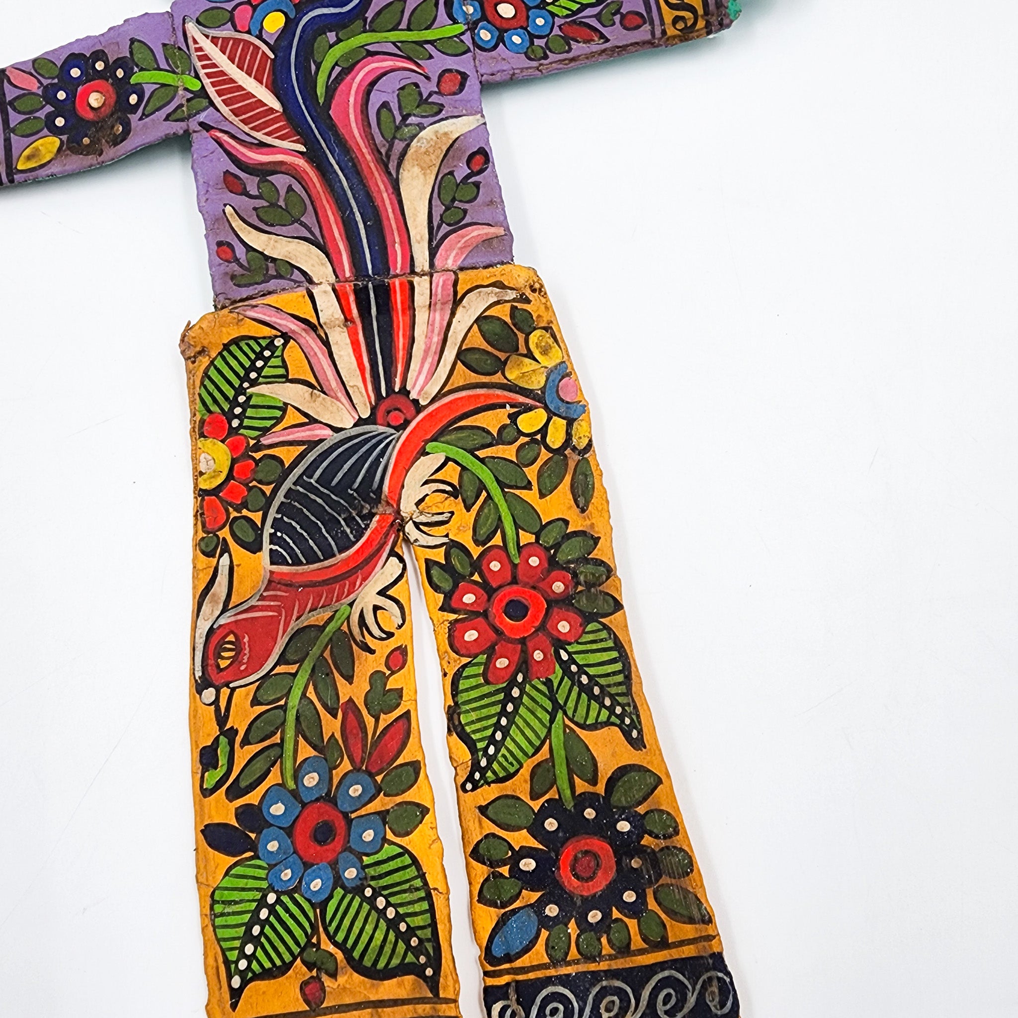 Muñeco artesanal con máscara de coco
