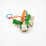 Peluche axolote de lana artesanal