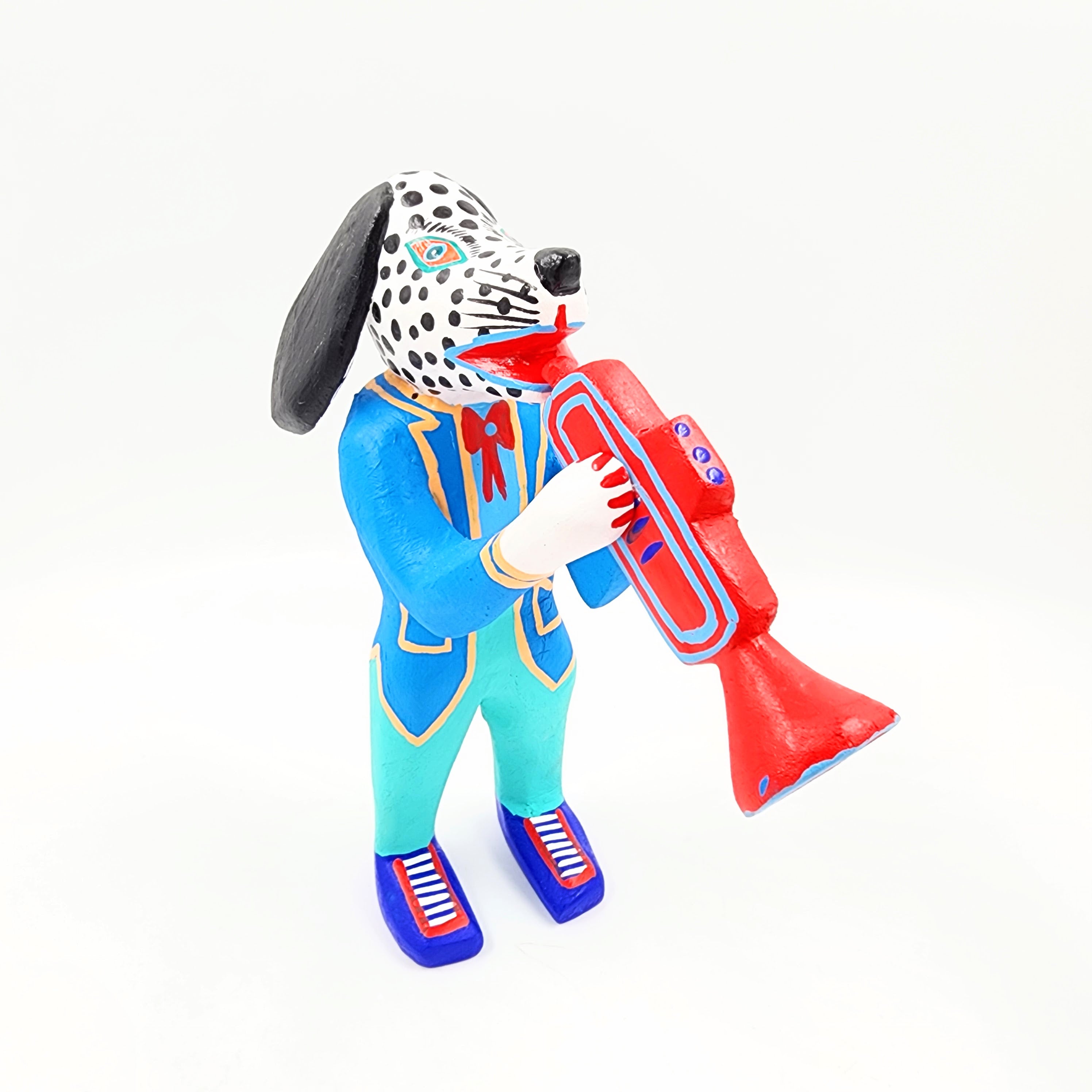 Perro con saxofón - talla de madera alebrije