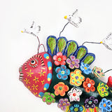 Pez con flores de Barro Betus artesanal