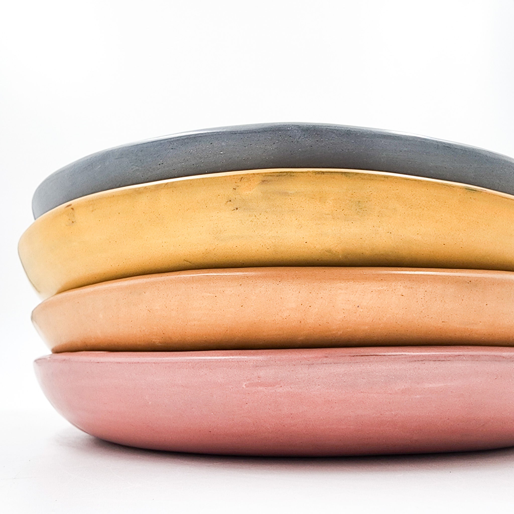 Round burnished clay plate