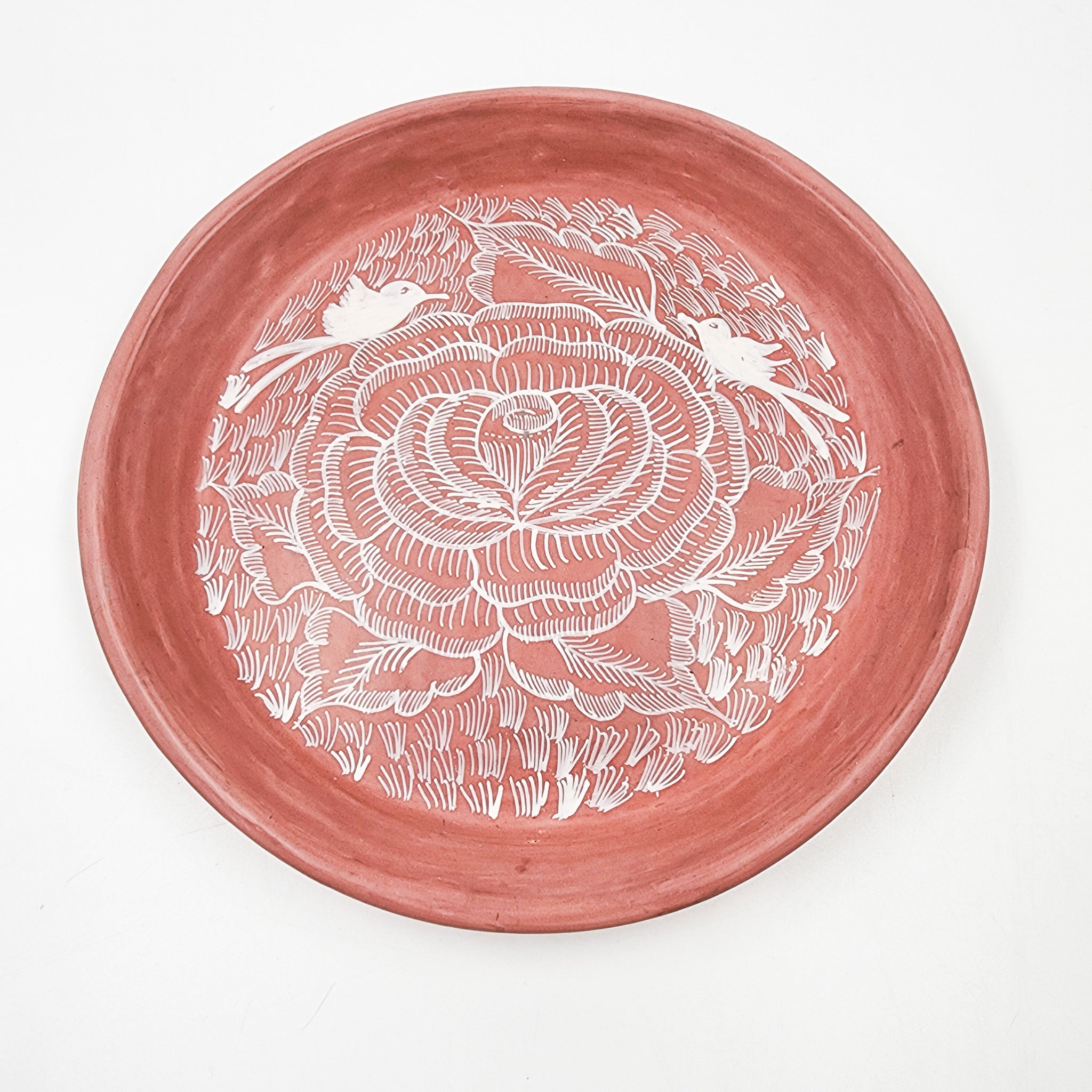 Round burnished clay plate