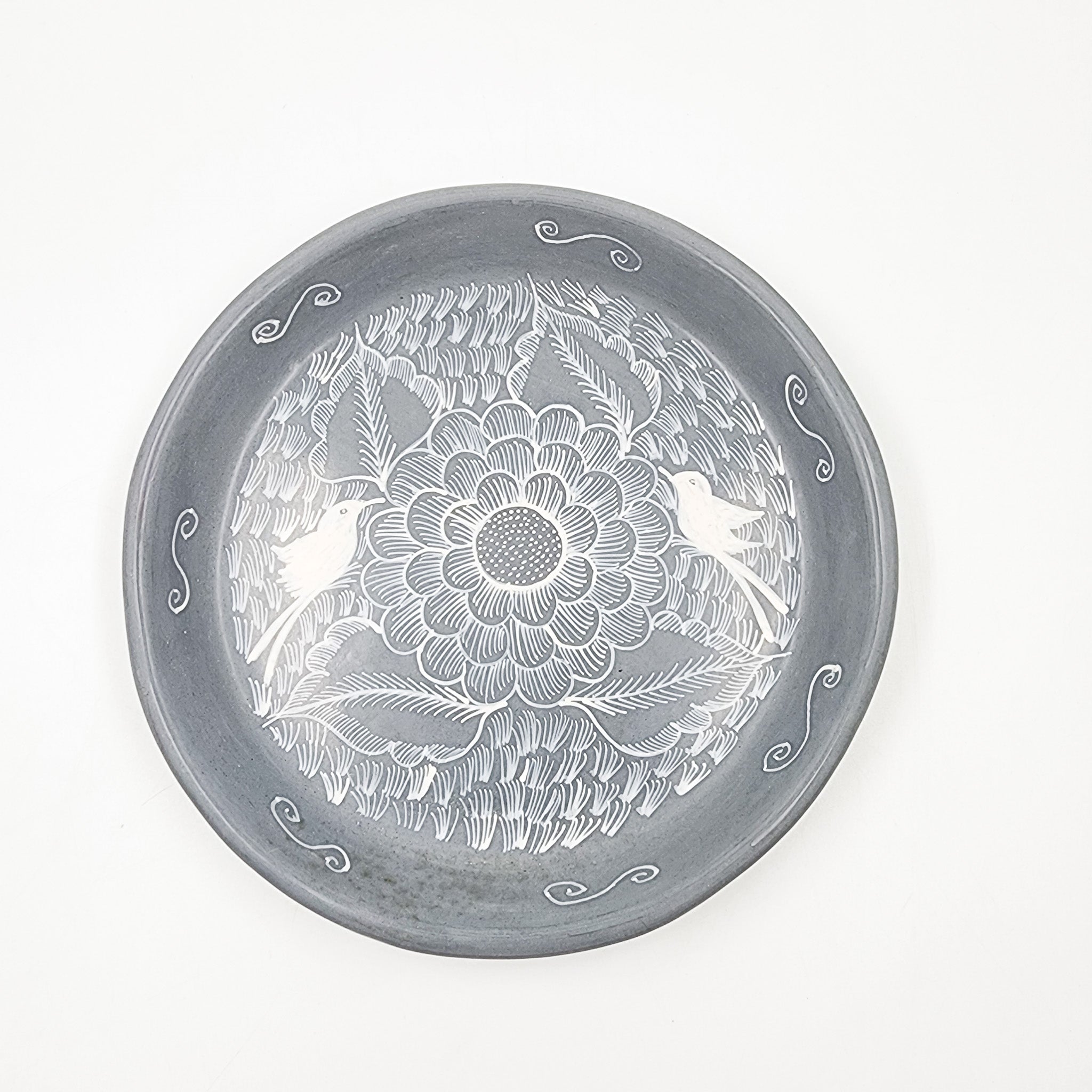 Round burnished clay plate
