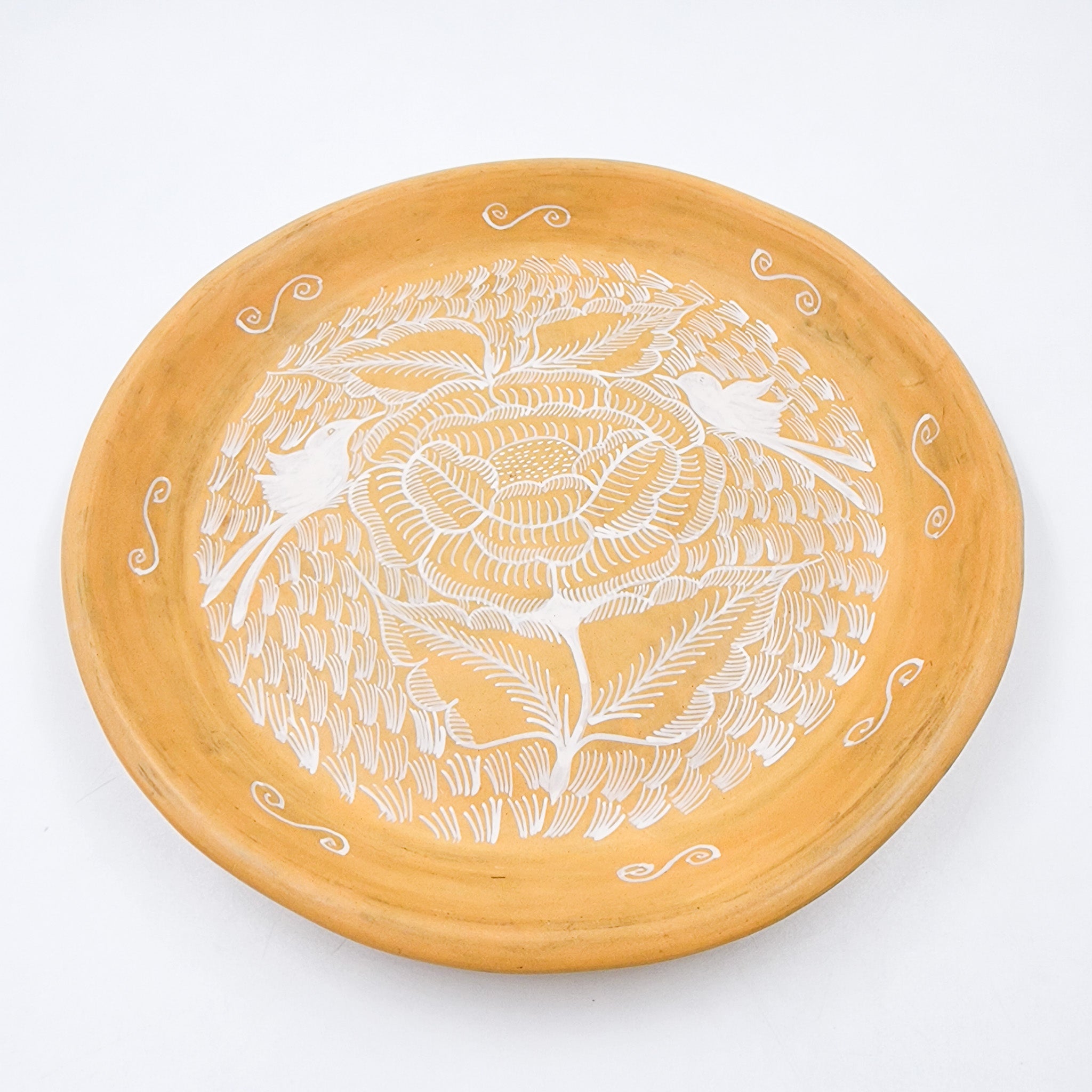 Round burnished clay plate