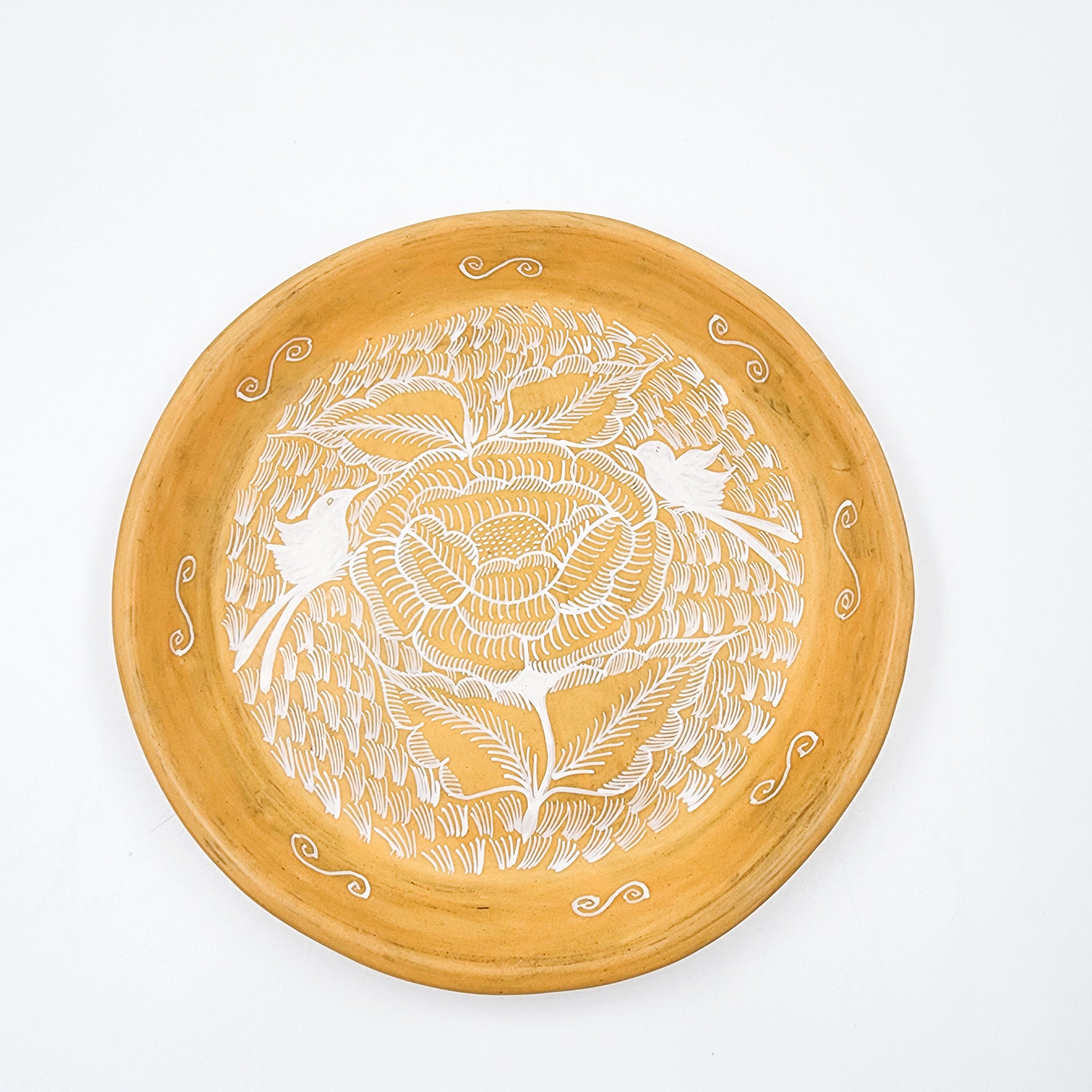 Round burnished clay plate