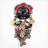 Sirena artesanal hecha de coco