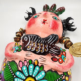 Sirena artesanal hecha de coco