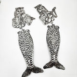 Sirena hojalata repujada