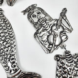 Sirena hojalata repujada