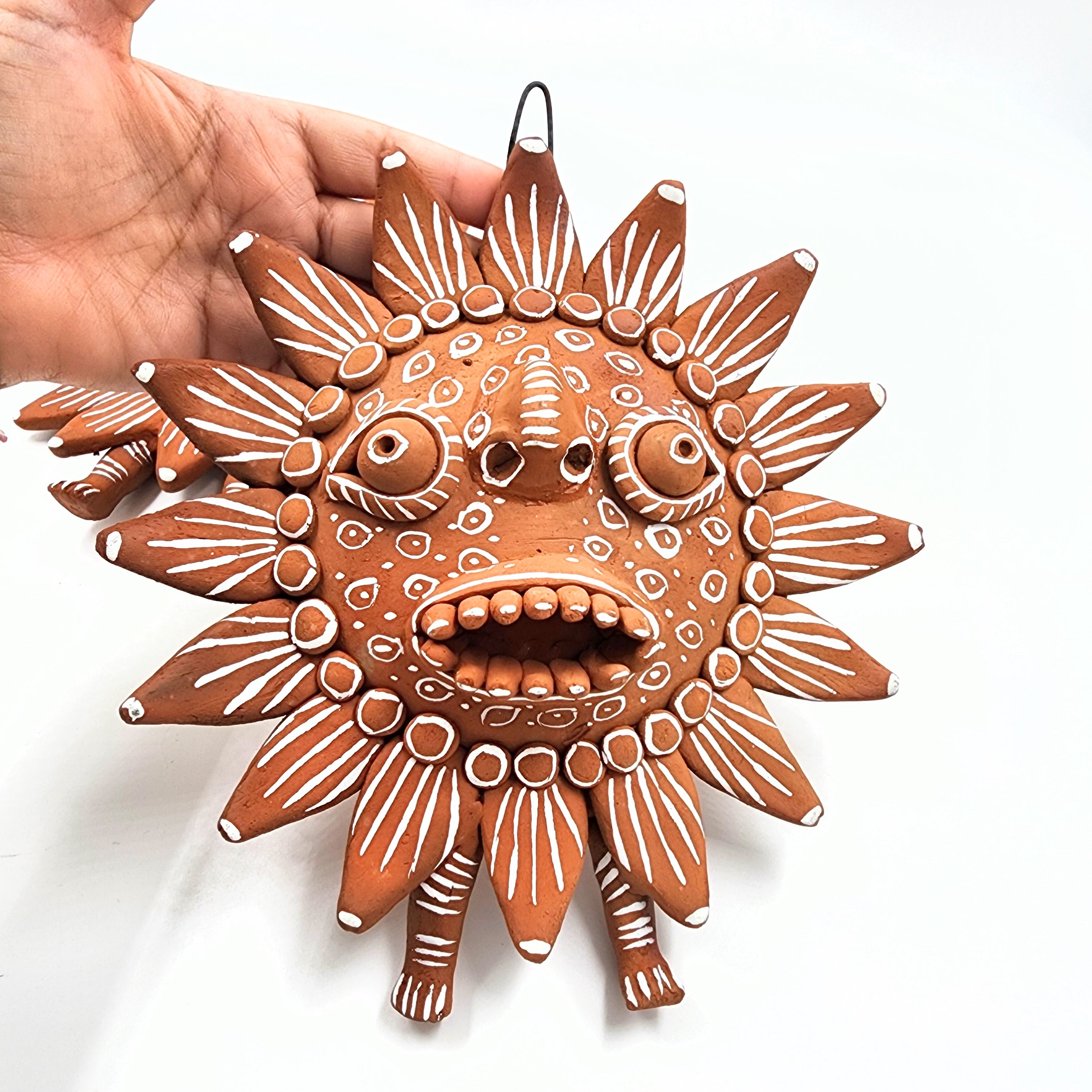 Sol de barro artesanal de Ocumicho