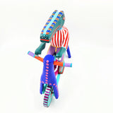 Cocodrilo en bicicleta — Talla de madera alebrije