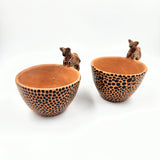 Taza artesanal de barro con jaguar