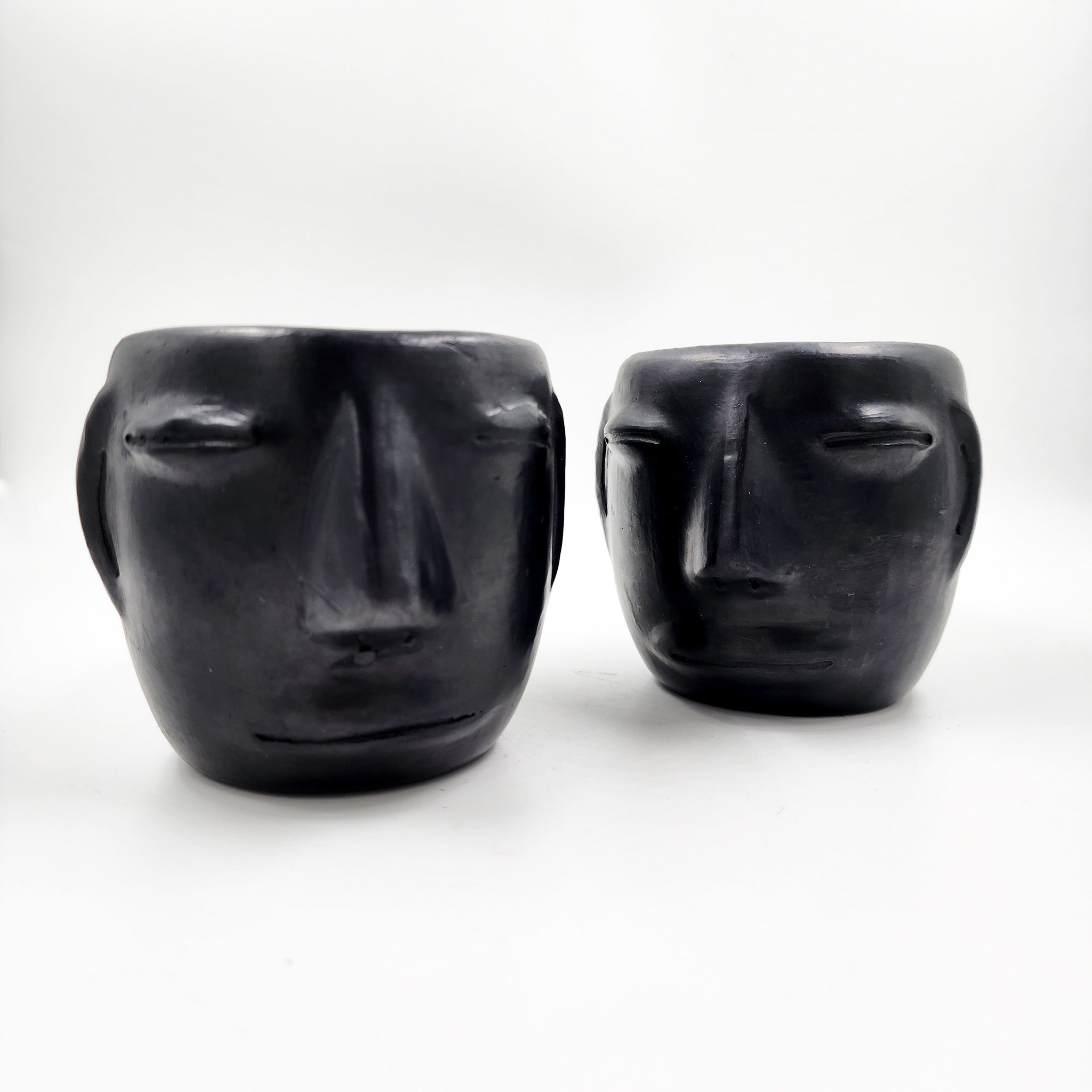 Taza Carita de barro negro