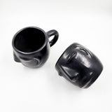 Taza Carita de barro negro