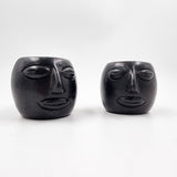 Par de tazas carita para espresso de barro negro