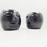 Par de tazas carita para espresso de barro negro