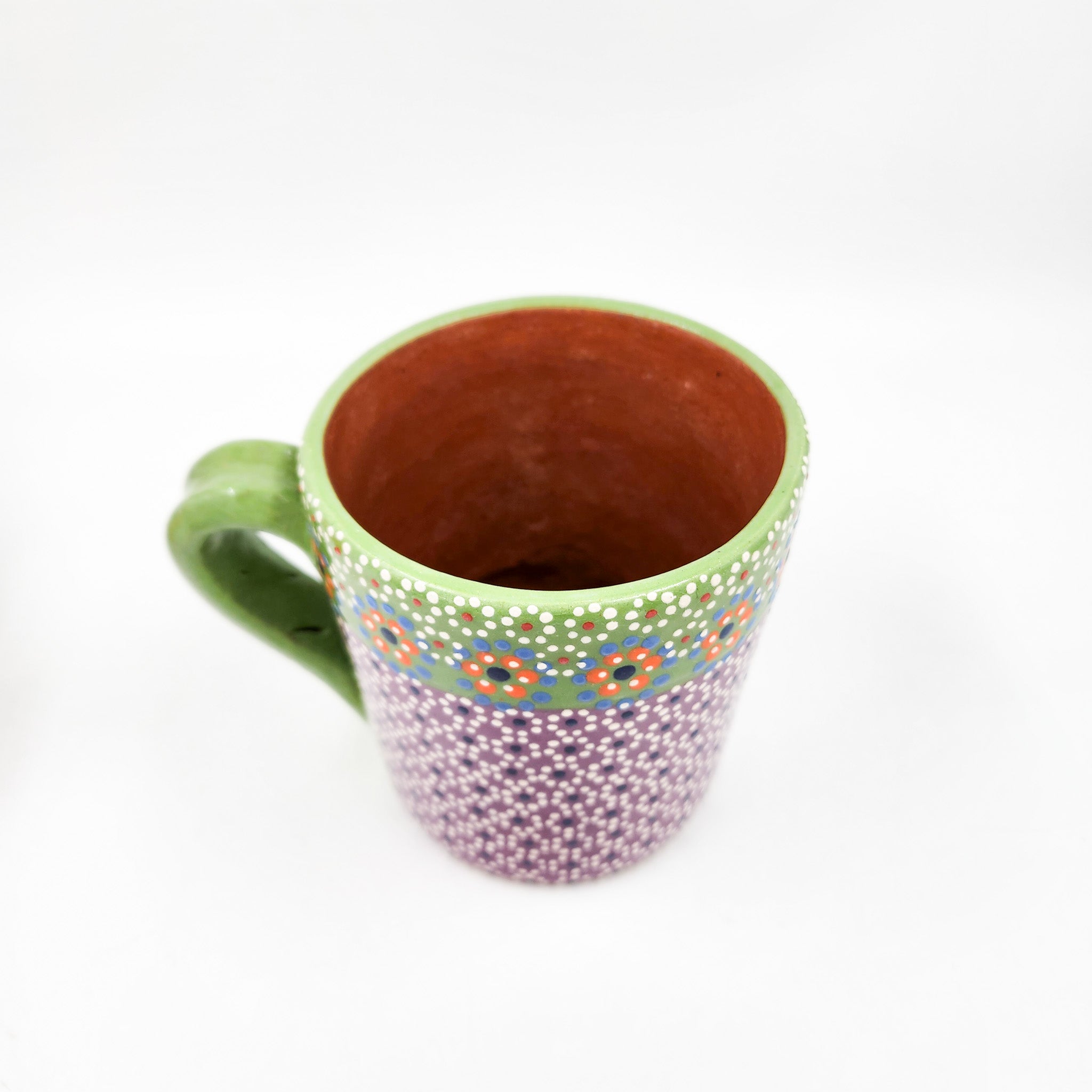 Taza de barro capulineado