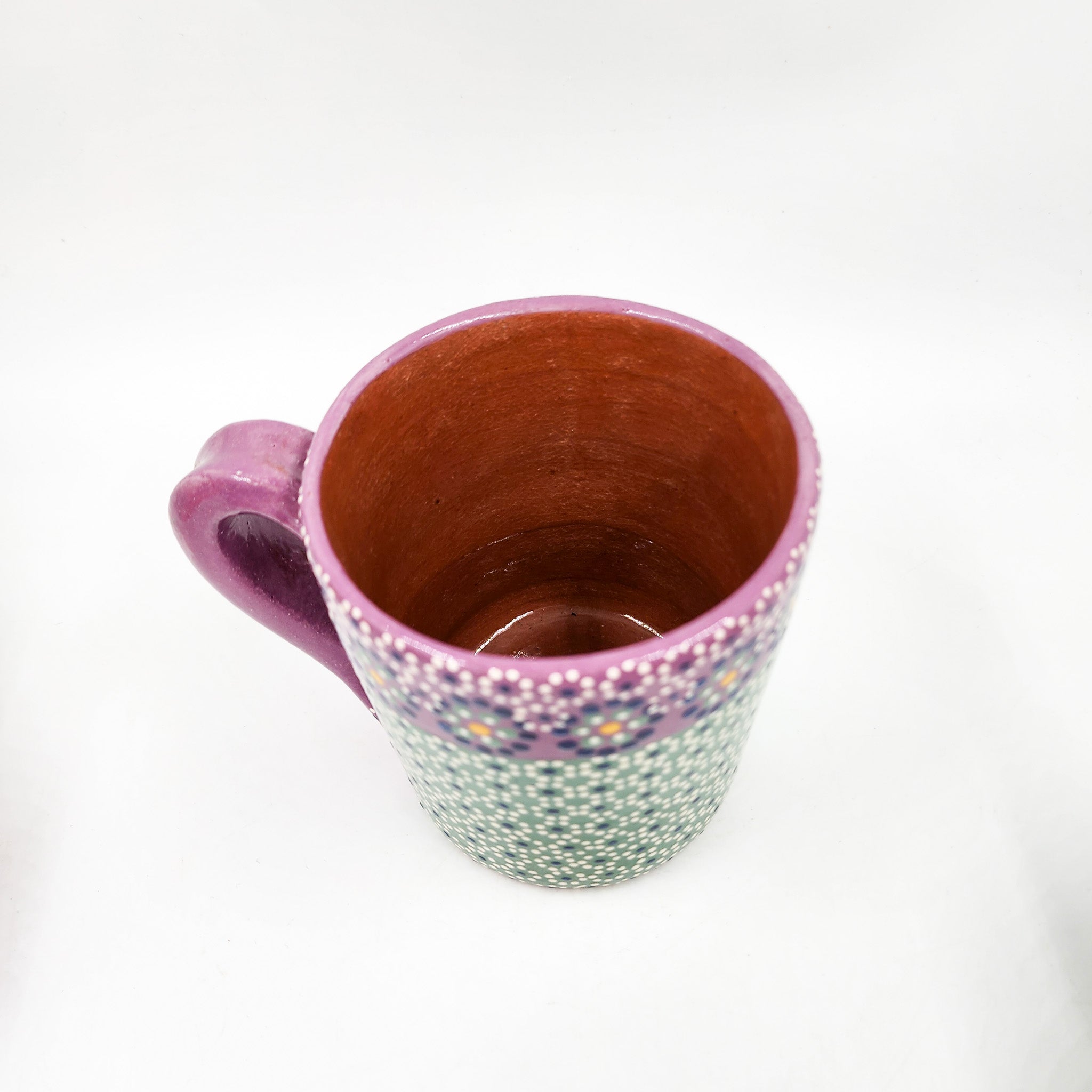 Taza de barro capulineado