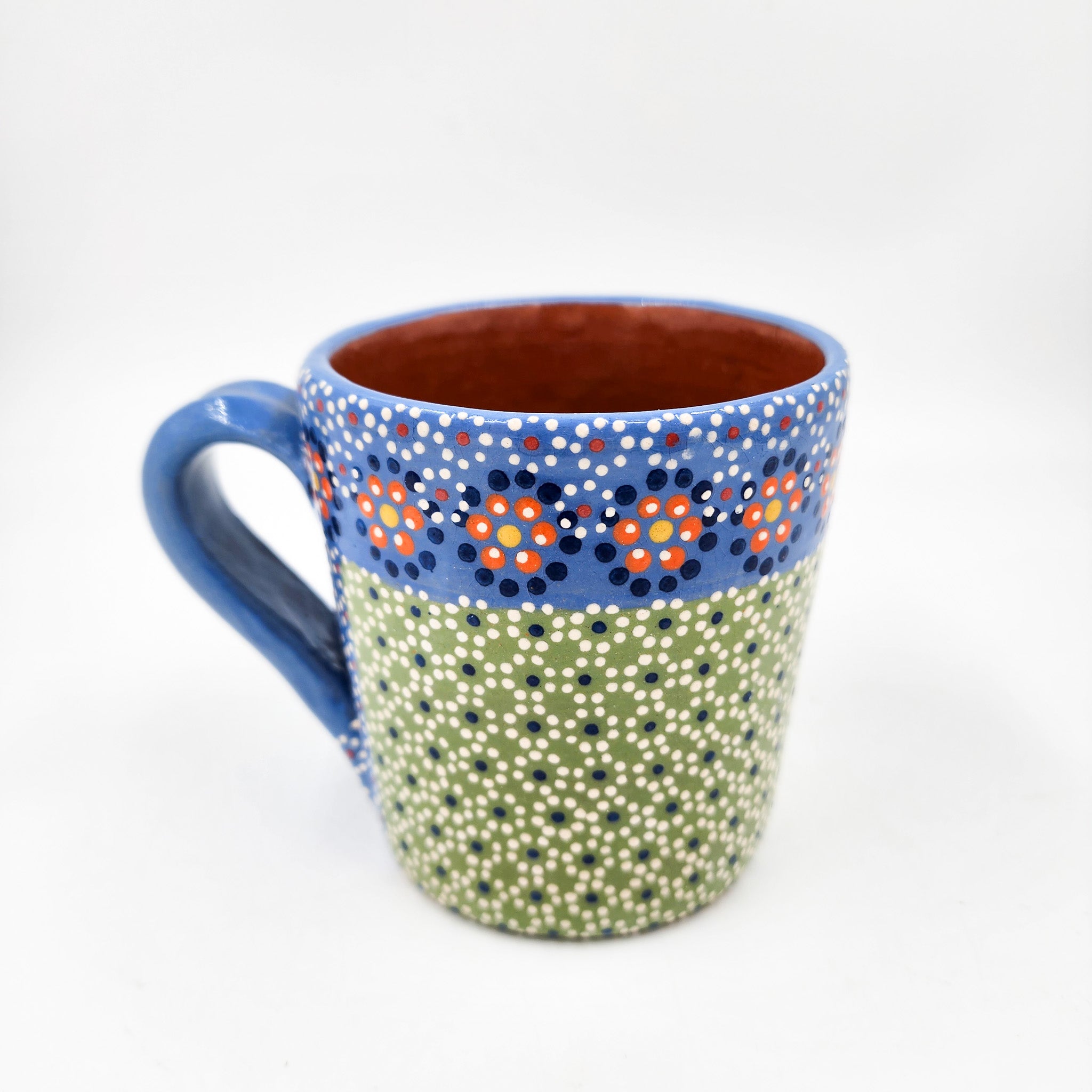 Taza de barro capulineado